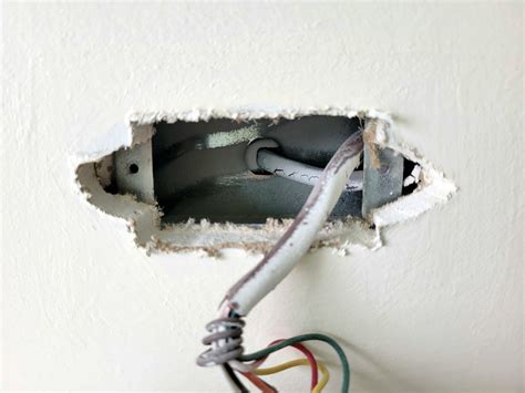 filling holes around electrical box|drywall holes in electrical box.